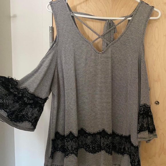 Sunflower shirt has NEVER BEEN WORN! Both are from Maurice’s. - Picture 2 of 2